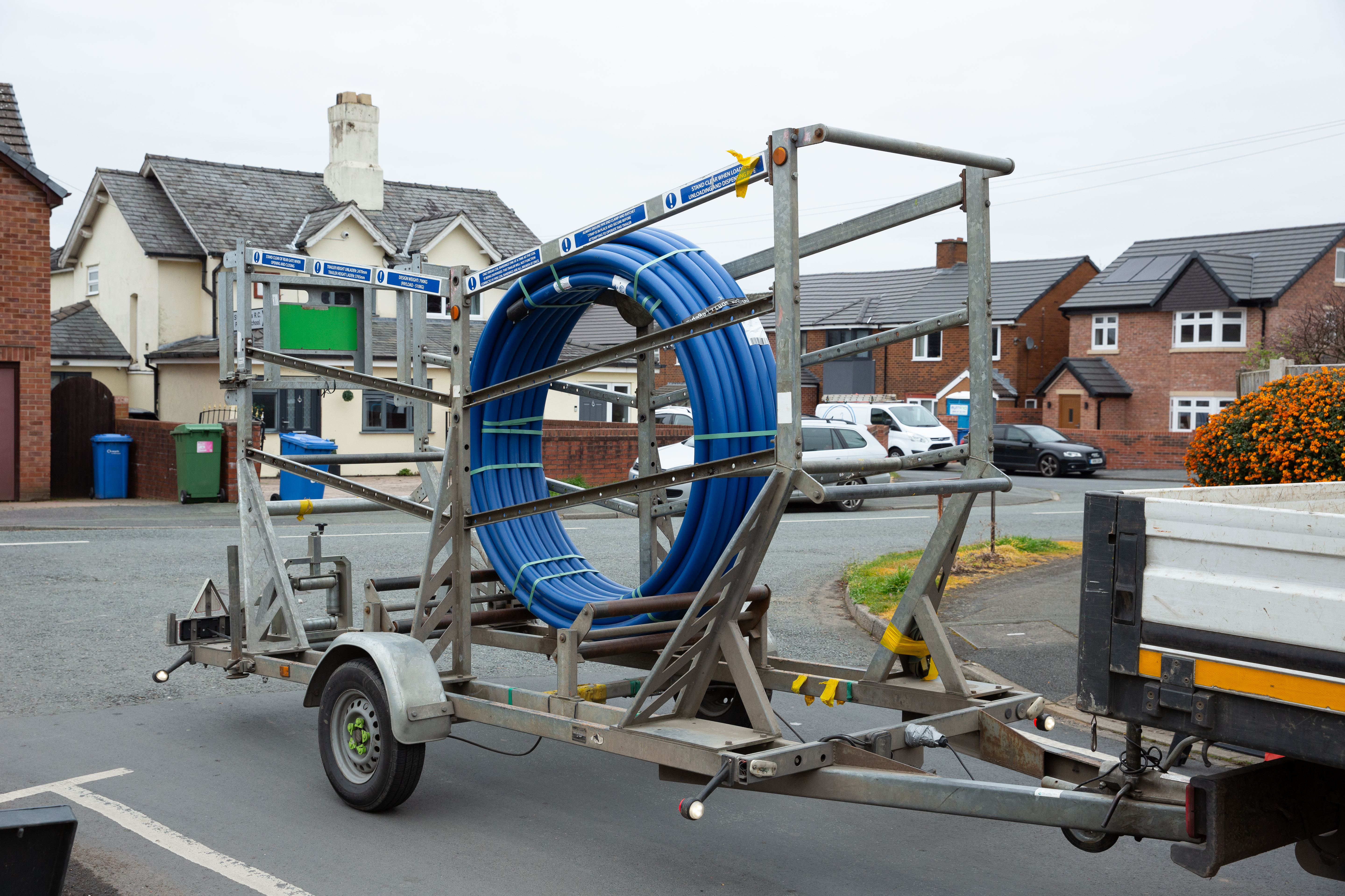 Pipe coil transports on a trailer