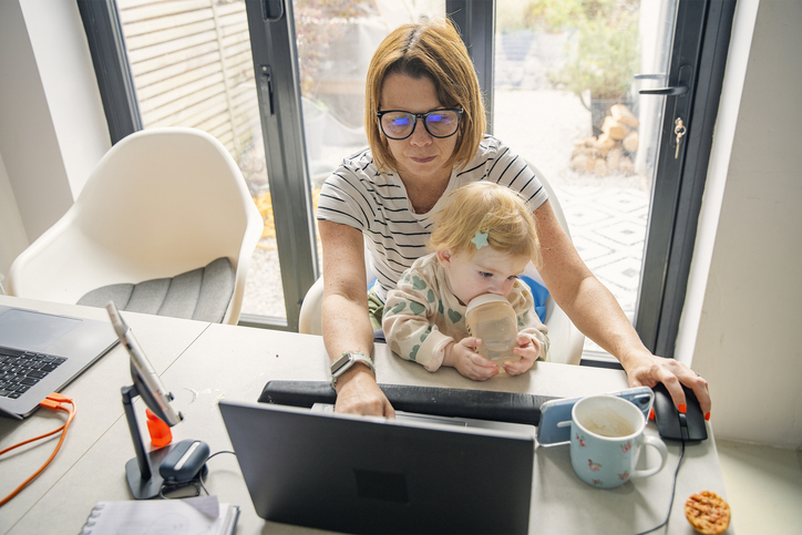 Woman with baby on lap