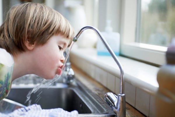 Boy dinking water