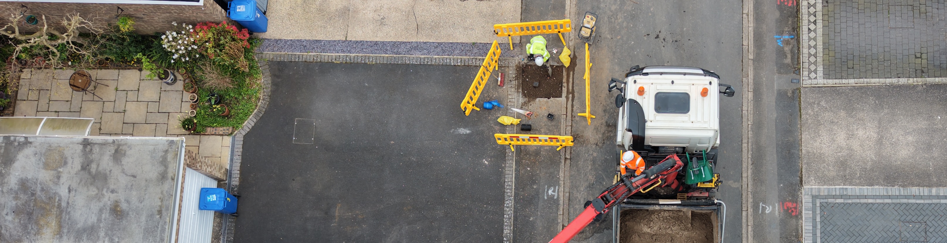 Birds-eye overhead view of road digging